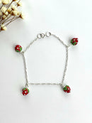 PULSEIRA 4 MORANGUINHOS CRAVEJADOS EM RESINA VERDE-CLARO