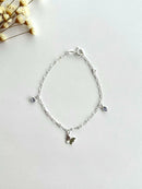 PULSEIRA BORBOLETA DOBRADA COM CORAÇÕES LILÁS