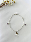 PULSEIRA BORBOLETA DOBRADA COM ZIRCÔNIA ROXA