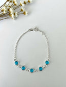 PULSEIRA 5 ZIRCÔNIAS G AZUL CLARO